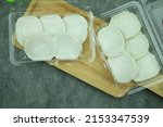 Small photo of Thai traditional dessert : Khanom Thuay is Thai of kind sweetmeat, steamed sweet coconut milk custard cream with powder
