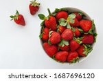 Ripe Red Strawberries On White...