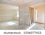 Construction building industry new home construction interior drywall tape and finish details installed door for a new home before installing