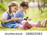 Two Little Girls With Chickens