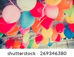 Colorful balloons floating on the ceiling of a party in vintage childhood memory color style for festival like birthday or christmas celebration party