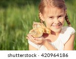Portrait Of Little Girl With...