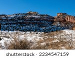 Winter landscape from South Camp Road in Grand Junction. Colorado with red sandstone cliffs of the Colorado National Monument.
