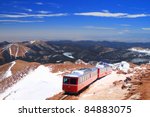 View of Pikes Peak and Manitou Springs Train on the top of Pikes Peak Mountain, Colorado, USA
