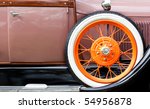 Old Car With Orange Tire Profile