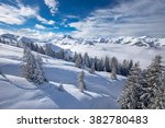 Trees covered by fresh snow in Austria Alps from Kitzbuehel ski resort - one of the best ski resort in the workd with 54 cable cars, 170 km prepared skiing slopes and place of famous hahnenkamm races.