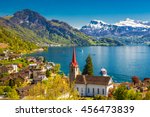 Famous boats on lake Lucerne (Vierwaldstatersee) in Weggis village with the view of Pilatus mountain and Swiss Alps in the background near famous Lucerne (Luzern) city, Switzerland