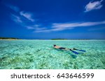 Young Man Snorkling In Tropical ...