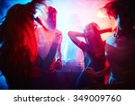Young people dancing in nightclub