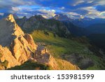 Mountain landscape with summits and valley at sunset, Dolomite Alps, Italy