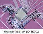 Microprocessor on a printed circuit board, close-up, top view, in inverted colors. Macro photography