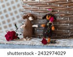 Small photo of couple of bonded dogs dachshund toy with yarn and knitting accessories