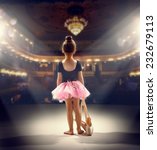 Little girl plays in the ballet
