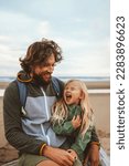 Family father with child outdoor dad with daughter happy laughing face vacations lifestyle together candid emotions