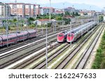 high-speed trains: two trains on tracks ready to travel and transport passengers for economic activities and tourism. Ideal for traveling on holidays, economic and green transport par excellence.