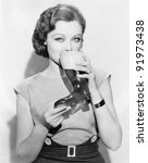 Woman Drinking Beer Out Of A...