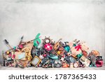 Old antiques and retro collectibles memorabilia dumped in a huge pile. Garage sale, attic room storage conceptual still life or disposal and recycling of outdated objects. Vintage style filtered photo