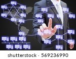 Small photo of Businessman hand touching virtual panel of virtual panel of computer network topology