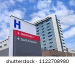 Small photo of direction sign with capital letter H for hospital
