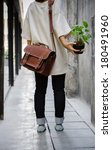 Woman With Brown Leather Bag...