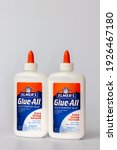Small photo of ST. PAUL, MN, USA -FEBRUARY 28, 2021: Elmer's Glue-All glue container's and trademark logo.