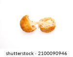 Small photo of Breaded chicken meat balls with oozing stretchy mozzarella cheese isolated on a white background.