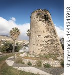 Small photo of old Watchtower on the coastline of Torremuelle