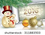 christmas card with snowmen in... | Shutterstock .eps vector #311883503