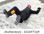 Man is lying on a icy way