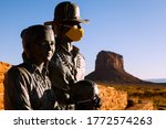 Small photo of WINDOW ROCK, UTAH/USA - JULY 1 2020 : Two of three statues of the Native American family outside of Monument Valley wear face masks for COVID-19, the mother is unmasked, the park is closed.