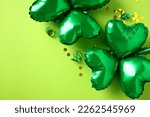 Green shamrock shaped balloons...