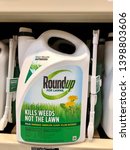 Small photo of San Jose, CA - May 15, 2019: Closeup of large container of Round up weed killer on a store shelf. Made by Monsanto Corporation.