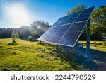 Small photo of Solar energy panel installed in the field against bright sun, environmental equipment for the production of renewable energy, alternative source of clean electricity