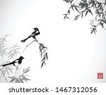 two magpie birds on bamboo...