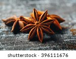 Food Background with Close-up of Star Anise on Vintage Black Table. Selective Focus. 