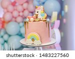 birthday party of a baby concept unicorn. girls birthday decorations. A beautiful bright cake decorated in the form of fantasy unicorn.children birthday candy bar