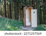 New open wooden outdoor toilet, outhouse in forest in beskids mountains.