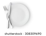 Fork and knife on a empty plate