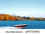 Power Boating On An Autumn Lake