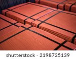 Small photo of Piles of cathode copper plates at metal purification plant