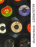 Small photo of Woodbridge, New Jersey / United States - October 11, 2018: A collection of 1960s 45 speed records, including the Beatles, Don McLean, Four Tops, Aretha Franklin, and Creedence Clearwater Revival.