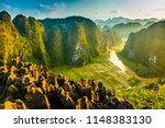 Beautiful sunset landscape viewpoint from the top of Mua Cave mountain, Ninh Binh, Tam Coc in Vietnam