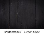photo of dark wood background... | Shutterstock . vector #169345220