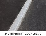 White Curb Stone Border And...