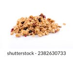 Muesli cereals close up with  raisins, oat and wheat flakes, fruits, strawberry, cranberry, cherry pieces. Isolated on white