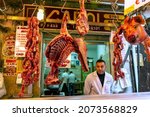 Small photo of PALERMO, ITALY- APRIL 28 2018: Butcher and meat in Ballaro Market in Palermo, Italy