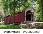 Vermont Covered Bridge is located at Highland Park, Kokomo, Howard County, Indiana. It was built in 1875, using a Smith Type #3 Truss construction, by Smith Bridge Co. of Toledo, Ohio. 