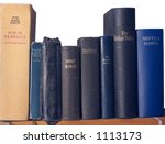 Shelf Of Bibles In Different...