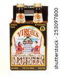 Small photo of TWINSBURG, OH, USA - FEBRUARY 7, 2015: A four-pack of Virgil's Root Beer on white. Virgil's is a microbrewed root beer and produced in Los Angeles, California, by Reed Inc.