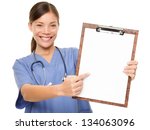 Nurse Showing Medical Sign...